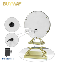 Miroir de maquillage rond doré clair avec anneau lumineux intégré et base rectangulaire, miroir de vanité LED de table