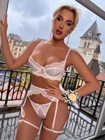Ensemble de lingerie féminine ultra-fin et sexy en maille blanche, soutien-gorge ajouré et bas, ensemble quatre pièces avec emballage en sachet