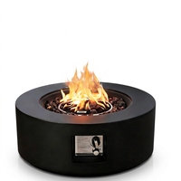 Table de feu ronde Orizaba en béton renforcé de fibres de verre, artisanale, haut de gamme, en acier au carbone sur mesure, pour extérieur, en pierre calcaire.