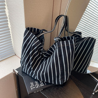 Vente en gros de sacs cabas tendance personnalisés rayés en tissu et coton de couleur sac à provisions lourd imprimé sac de plage en toile avec poignée en corde