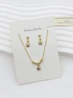 Ensemble de bijoux plaqué or 18 carats en cuivre avec pendentif dentaire et boucles d'oreilles, vente en gros