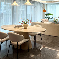 Table à manger ovale de style français antique en bois de teinte crème, finition marbre, sensation haut de gamme, résistante à l'eau - Restaurant
