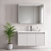 Meuble de salle de bain en PVC au design épuré avec miroir LED intelligent anti-buée, ensemble de lavabo de salle de bain étanche
