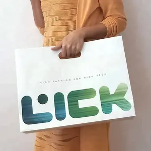 Bolsas de compra de papel ecológico con logotipo personalizado, venta al por mayor, con orificio para el mango