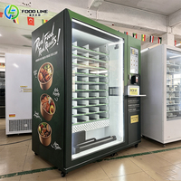 Distributeur automatique de nourriture intelligent avec écran tactile et four à micro-ondes pour la préparation de repas chauds