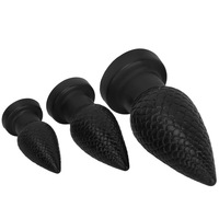 Plug anal en silicone noir surdimensionné avec ventouse, pointe pointue, design épais de la taille d'un poing pour l'entrée postérieure, jouet sexuel