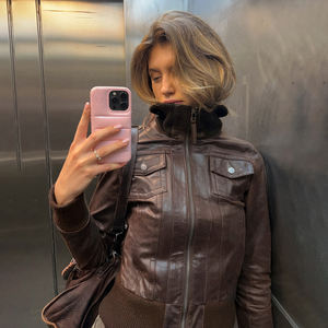 Veste en similicuir style streetwear américain pour femme, avec fermeture éclair, poches utilitaires, effet amincissant à la taille, style vintage - Product Image 1