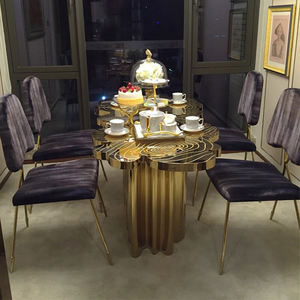 Table à manger moderne et légère de luxe en acier inoxydable et métal de style nordique personnalisé de forme spéciale haut de gamme pour le salon - Product Image 2