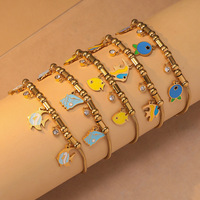 Bracelet en acier inoxydable plaqué or 18 carats résistant au ternissement pour femmes, avec breloque en forme de poisson en zircone, chaîne à maillons, bijoux tendance, cadeau