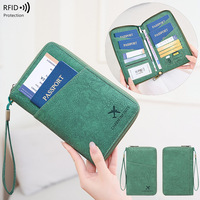Portefeuille de voyage minimaliste et élégant avec blocage RFID pour passeport et cartes de crédit, avec rangement pour billets de voyage et cartes de visite (matériau PU)