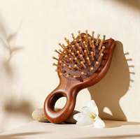 Peigne à coussin d'air en bois en forme de chat, avec tête pour brosser les poils, vente en gros du fabricant. Peigne à air portable pour la maison