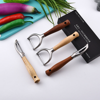 Éplucheur de melon en acier inoxydable avec manche en bois, couteau à éplucher, gadget de cuisine avec boîte d'emballage