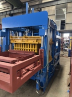 Machine à blocs entièrement automatique QT10-15 avec système de mélange frontal pour produits en béton coloré