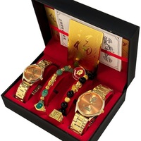 Vente en gros directe usine E-commerce Chine Coffret cadeau commémoratif Or Couple Énergie Quartz Meilleures ventes Ventes d'entreprise