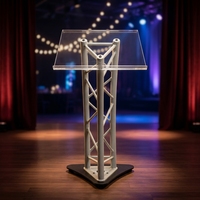 Podium élégant en aluminium et acrylique transparent avec roulettes silencieuses 8-12 kg pour galas, événements d'entreprise, expositions