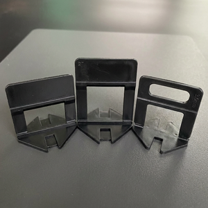 Clips et cales de nivellement portables pour système de nivellement de carreaux – Clips blancs, cales rouges – Utilisation professionnelle par les carreleurs uniquement - Product Image 1