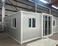 Maison modulaire préfabriquée de 20 pieds, 40 pieds, couleur blanche, isolée thermiquement, anticorrosion, profilée, type conteneur