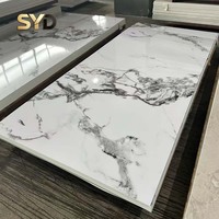 Panneau mural en PVC style moderne, imperméable et ignifuge, effet marbre UV, finition mate ou brillante.