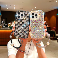 TPU de luxe haut de gamme pour iPhone 16 Pro Max pour iPhone 15 pour iPhone 14 étui de téléphone portable stéréo strass poignée de téléphone pour femmes