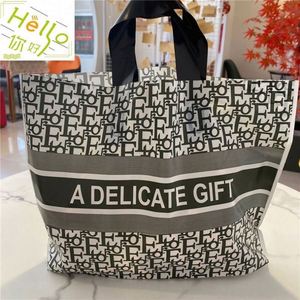 Bolsas de Regalo de Plástico Biodegradable con Logotipo Personalizado al por Mayor, con Válvula y Asa de Mano, Bolsas de Compra Transparentes - Product Image 3