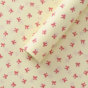 Papel de seda para embalaje de 50*70cm, base amarilla crema con lazo rojo, stock de fábrica, se puede usar para embalaje de flores y ropa. - Product Image 1