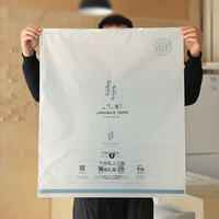 Sac transparent givré à fermeture éclair en plastique PE de grande taille pour vêtements, doudoune, rideau, emballage avec logo
