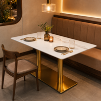 Table de restaurant rectangulaire avec plateau en pierre frittée, base à double poteau en laiton, résistante aux rayures et à la chaleur
