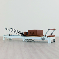 Machine de Pilates Reformer avec cadre en aluminium, logo personnalisé, 70 couleurs, équipement de fitness commercial pour studio, santé et bien-être