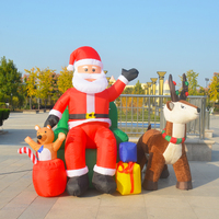 Père Noël gonflable géant personnalisé sur moto pour la décoration extérieure de jardin/cour, certifié CE, durable