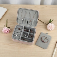 Boîte à bijoux portable en cuir PU, fermeture éclair élégante pour le rangement et l'emballage de bagues, colliers et boucles d'oreilles