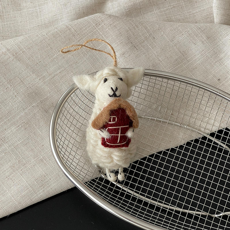 Casa de abrazos, ovejita blanca de 12 cm.