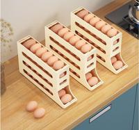 Accessoire de cuisine Boîte de rangement automatique d'œufs Porte-conteneur roulant pour réfrigérateur Organisateur d'œufs Distributeur de conteneurs