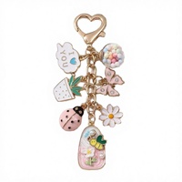 Porte-clés en alliage de zinc motif papillon, fleur, nuages, dessin animé, plantes en pot, insectes, bijoux faits à la main pour femmes et filles