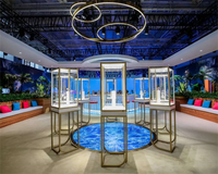 Vitrine à bijoux de luxe en acier inoxydable, vitrine à bijoux en forme de tour, verre incurvé, éclairage LED intelligent, serrure électronique, personnalisable