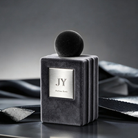 Flacon de parfum en verre personnalisé de 100 ml avec traitement de surface floqué, fabricant d'emballages de parfum OEM ODM