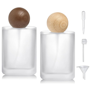 Venta al por mayor de envases de perfume de lujo para mujer, personalizados, de 30 ml y 50 ml, con tapa pulverizadora de rosca, vacíos, esmerilados, cuadrados, de vidrio serigrafiado. - Product Image 1
