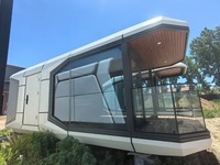 Capsule spatiale modulaire pliable haut de gamme et minimaliste, hôtel préfabriqué, mini-maison mobile pour le glamping, les parcs, les séjours à la maison d'hôtes et les complexes hôteliers