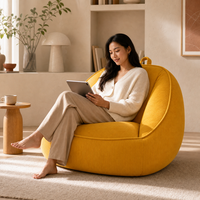 Fauteuil de salon de haute qualité, canapé compressé en boîte, petit canapé jaune moutarde au design cocon pour adultes et enfants dans la salle de lecture