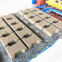 Qt4-20 entièrement automatique hydraulique creux solide cendres volantes sable couleur finisseur bloc de construction à emboîtement brique faisant la Machine
