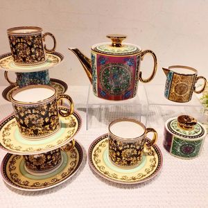 Service à thé en céramique de luxe, best-seller, 11 pièces et 15 pièces, poignée dorée, porcelaine osseuse, tasse à café - Product Image 1