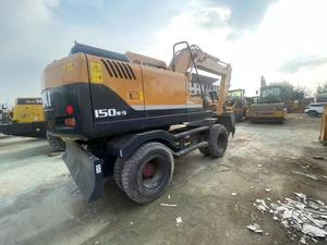 Excavatrice sur pneus Hyundai 150W-9 d'occasion, faible nombre d'heures de fonctionnement, 15 tonnes, provenance Corée, avec coupleur rapide et brise-roche, certifiée CE - Product Image 2