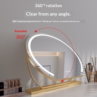 Miroir de maquillage intelligent de bureau avec cadre rond en métal doré LED, 1x grossissement, avec lumières LED à 3 couleurs réglables pour la chambre à coucher