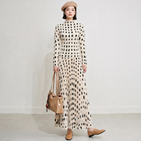 Ensemble deux pièces plissé pour femme, imprimé taches d'encre, haut à col montant et manches longues & jupe longue, style Miyake élégant, vente en gros