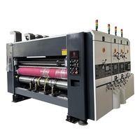 Machine automatique d'impression, de rainurage et de découpe à deux couleurs à base d'eau pour carton ondulé, destinée aux usines de boîtes en carton