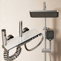 Ensemble de douche gris anthracite à affichage numérique, avec commandes à touches piano, fonction pluie, douchette à main et bidet
