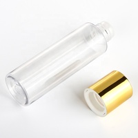 Botella de plástico con tapa dorada, recipiente transparente de lujo para el cuidado de la piel, con tapón de rosca, venta al por mayor
