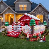 Parc de jeux gonflable avec thème maison de neige et décorations bonhomme de neige pour fêtes de Noël en extérieur et en intérieur