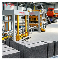 Machine à pavés entièrement automatique QT6-15D pour petits investisseurs souhaitant créer une petite usine de briques de ciment autobloquantes