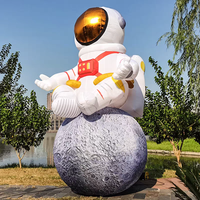 Astronaute gonflable de festival de musique avec boule de terre Spaceman gonflable extérieur personnalisé pour la décoration de scène de musique