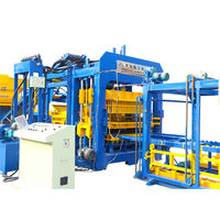 Machine de pavage à verrouillage QT15-15 entièrement automatique 3 trous durables pour matériau en ciment avec boîte de vitesses PLC pour pompe à moteur